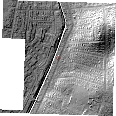 Shaded relief map of the ground around RM52UX, computed from Environment Agency LiDAR. The ground here sits at about 29 m above sea level and falls 30 m across the surrounding 800 m. Surface water reaching this point runs off ground lying to the east-north-east, 26.3 m higher.