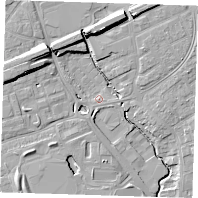 Shaded relief map of the ground around RM70AD, computed from Environment Agency LiDAR. The ground here sits at about 12 m above sea level and falls 18 m across the surrounding 800 m. Surface water reaching this point runs off ground lying to the south-west, 5.6 m higher.