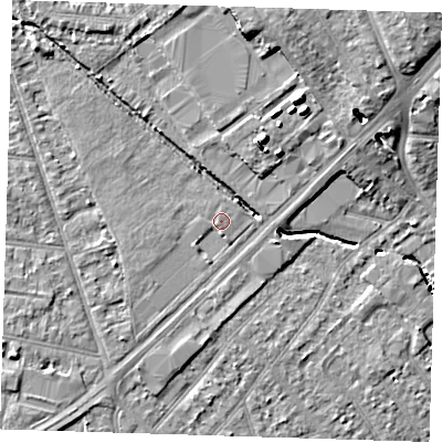 Shaded relief map of the ground around RM77AY, computed from Environment Agency LiDAR. The ground here sits at about 18 m above sea level and falls 10 m across the surrounding 800 m. Surface water reaching this point runs off ground lying to the south-west, 1.6 m higher.