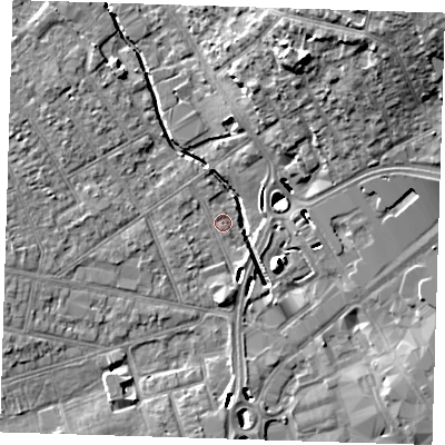 Shaded relief map of the ground around RM77DP, computed from Environment Agency LiDAR. The ground here sits at about 14 m above sea level and falls 17 m across the surrounding 800 m. Surface water reaching this point runs off ground lying to the west-south-west, 3.2 m higher.