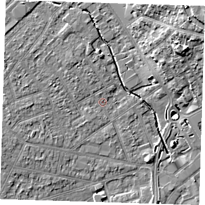 Shaded relief map of the ground around RM77DX, computed from Environment Agency LiDAR. The ground here sits at about 16 m above sea level and falls 17 m across the surrounding 800 m. Surface water reaching this point runs off ground lying to the north-west, 2.5 m higher.