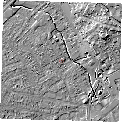 Shaded relief map of the ground around RM77EL, computed from Environment Agency LiDAR. The ground here sits at about 15 m above sea level and falls 19 m across the surrounding 800 m. Surface water reaching this point runs off ground lying to the west-north-west, 5.2 m higher.