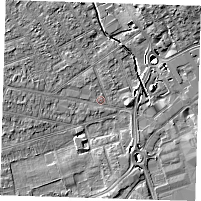 Shaded relief map of the ground around RM77HR, computed from Environment Agency LiDAR. The ground here sits at about 15 m above sea level and falls 12 m across the surrounding 800 m. Surface water reaching this point runs off ground lying to the north-west, 3.2 m higher.