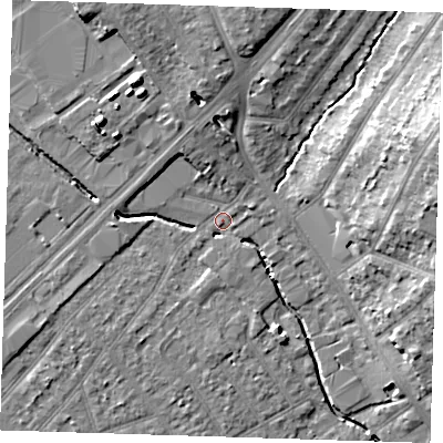Shaded relief map of the ground around RM77JR, computed from Environment Agency LiDAR. The ground here sits at about 16 m above sea level and falls 16 m across the surrounding 800 m. Surface water reaching this point runs off ground lying to the north, 6.5 m higher.