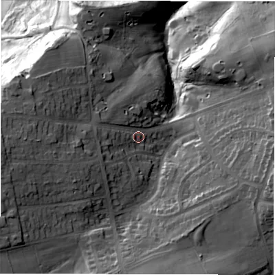 Shaded relief map of the ground around S104LE, computed from Environment Agency LiDAR. The ground here sits at about 270 m above sea level and falls 71 m across the surrounding 800 m. Surface water reaching this point runs off ground lying to the west, 16.5 m higher.