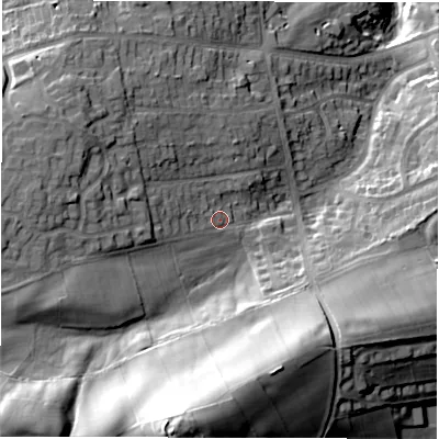 Shaded relief map of the ground around S104LU, computed from Environment Agency LiDAR. The ground here sits at about 277 m above sea level and falls 55 m across the surrounding 800 m. Surface water reaching this point runs off ground lying to the west, 13.5 m higher.