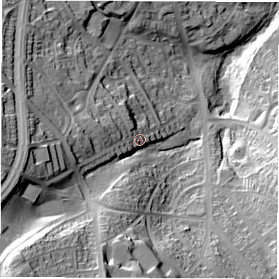 Shaded relief map of the ground around S21NP, computed from Environment Agency LiDAR. The ground here sits at about 128 m above sea level and falls 77 m across the surrounding 800 m. Surface water reaching this point runs off ground lying to the west, 18.8 m higher.