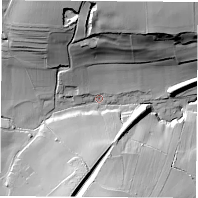 Shaded relief map of the ground around S251YA, computed from Environment Agency LiDAR. The ground here sits at about 86 m above sea level and falls 57 m across the surrounding 800 m. Surface water reaching this point runs off ground lying to the north, 50.9 m higher.
