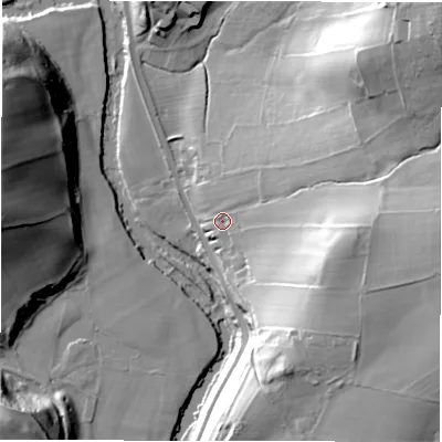 Shaded relief map of the ground around S323XF, computed from Environment Agency LiDAR. The ground here sits at about 121 m above sea level and falls 64 m across the surrounding 800 m. Surface water reaching this point runs off ground lying to the north-east, 48.9 m higher.