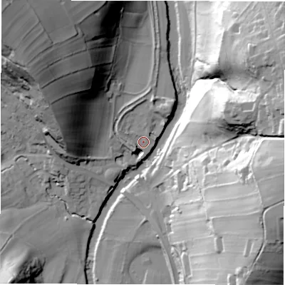 Shaded relief map of the ground around S323YU, computed from Environment Agency LiDAR. The ground here sits at about 119 m above sea level and falls 65 m across the surrounding 800 m. Surface water reaching this point runs off ground lying to the west-north-west, 7.5 m higher.