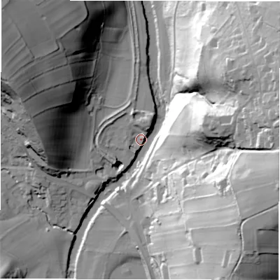 Shaded relief map of the ground around S323YW, computed from Environment Agency LiDAR. The ground here sits at about 118 m above sea level and falls 69 m across the surrounding 800 m. Surface water reaching this point runs off ground lying to the north-north-east, 8.2 m higher.