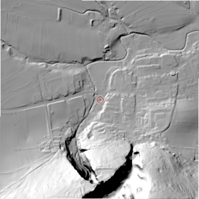 Shaded relief map of the ground around S338WN, computed from Environment Agency LiDAR. The ground here sits at about 186 m above sea level and falls 125 m across the surrounding 800 m. Surface water reaching this point runs off ground lying to the south-south-east, 119.1 m higher.