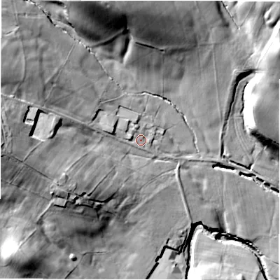 Shaded relief map of the ground around S369NN, computed from Environment Agency LiDAR. The ground here sits at about 242 m above sea level and falls 55 m across the surrounding 800 m. Surface water reaching this point runs off ground lying to the west-north-west, 26.6 m higher.