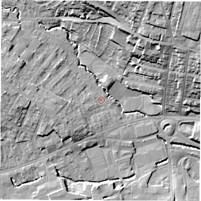 Shaded relief map of the ground around S401DW, computed from Environment Agency LiDAR. The ground here sits at about 83 m above sea level and falls 34 m across the surrounding 800 m. Surface water reaching this point runs off ground lying to the west, 7.9 m higher.