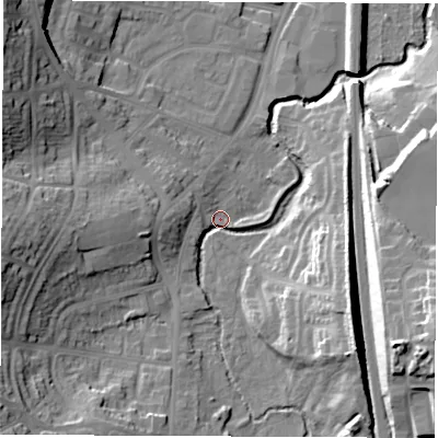 Shaded relief map of the ground around S402FB, computed from Environment Agency LiDAR. The ground here sits at about 76 m above sea level and falls 28 m across the surrounding 800 m. Surface water reaching this point runs off ground lying to the west, 21.3 m higher.