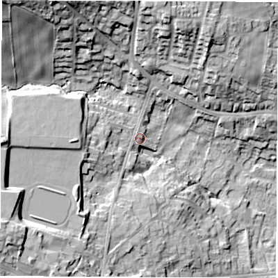 Shaded relief map of the ground around S403QA, computed from Environment Agency LiDAR. The ground here sits at about 104 m above sea level and falls 31 m across the surrounding 800 m. Surface water reaching this point runs off ground lying to the west-south-west, 16.1 m higher.