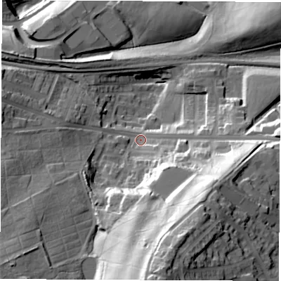 Shaded relief map of the ground around S703QR, computed from Environment Agency LiDAR. The ground here sits at about 77 m above sea level and falls 64 m across the surrounding 800 m. Surface water reaching this point runs off ground lying to the south, 49.5 m higher.