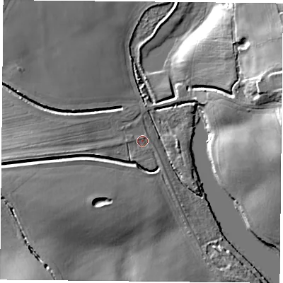 Shaded relief map of the ground around S803LL, computed from Environment Agency LiDAR. The ground here sits at about 51 m above sea level and falls 18 m across the surrounding 800 m. Surface water reaching this point runs off ground lying to the west-south-west, 13.6 m higher.
