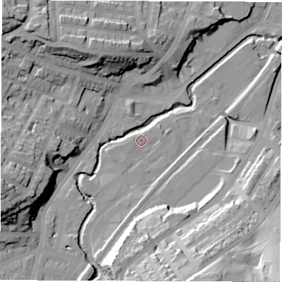 Shaded relief map of the ground around S80XN, computed from Environment Agency LiDAR. The ground here sits at about 77 m above sea level and falls 49 m across the surrounding 800 m. Surface water reaching this point runs off ground lying to the west-south-west, 2.1 m higher.