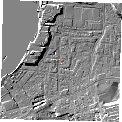 Shaded relief map of the ground around SE100AB, computed from Environment Agency LiDAR. The ground here sits at about 2 m above sea level and falls 13 m across the surrounding 800 m. Surface water reaching this point runs off ground lying to the south-east, 9.5 m higher.