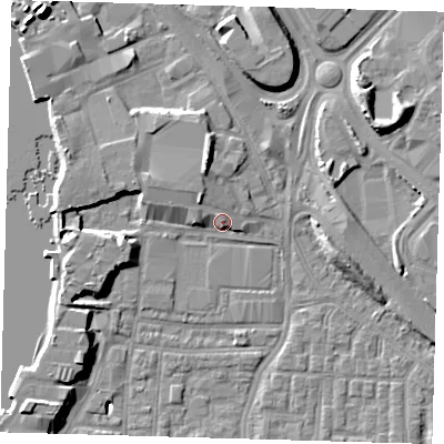 Shaded relief map of the ground around SE100AT, computed from Environment Agency LiDAR. The ground here sits at about 4 m above sea level and falls 13 m across the surrounding 800 m. Surface water reaching this point runs off ground lying to the north-north-west, 4.3 m higher.