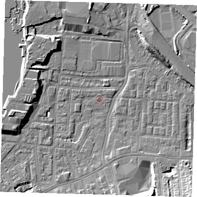 Shaded relief map of the ground around SE100AW, computed from Environment Agency LiDAR. The ground here sits at about 2 m above sea level and falls 11 m across the surrounding 800 m. Surface water reaching this point runs off ground lying to the south, 5.5 m higher.