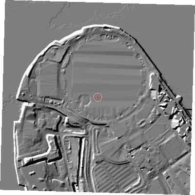 Shaded relief map of the ground around SE100DX, computed from Environment Agency LiDAR. The ground here sits at about 5 m above sea level and falls 14 m across the surrounding 800 m. Surface water reaching this point runs off ground lying to the east, 0.8 m higher.