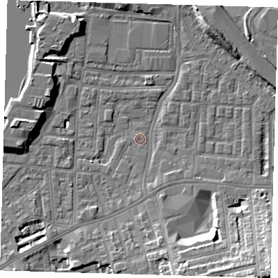 Shaded relief map of the ground around SE100DZ, computed from Environment Agency LiDAR. The ground here sits at about 2 m above sea level and falls 15 m across the surrounding 800 m. Surface water reaching this point runs off ground lying to the south, 2.3 m higher.