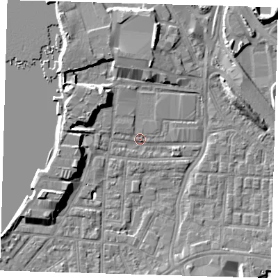 Shaded relief map of the ground around SE100EQ, computed from Environment Agency LiDAR. The ground here sits at about 2 m above sea level and falls 9 m across the surrounding 800 m. Surface water reaching this point runs off ground lying to the west-south-west, 8.9 m higher.