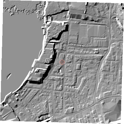 Shaded relief map of the ground around SE100EX, computed from Environment Agency LiDAR. The ground here sits at about 2 m above sea level and falls 9 m across the surrounding 800 m. Surface water reaching this point runs off ground lying to the south-south-west, 3.2 m higher.
