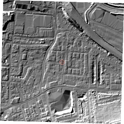Shaded relief map of the ground around SE100HB, computed from Environment Agency LiDAR. The ground here sits at about 2 m above sea level and falls 18 m across the surrounding 800 m. Surface water reaching this point runs off ground lying to the south-east, 14.4 m higher.