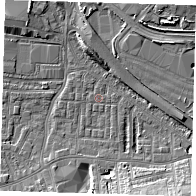 Shaded relief map of the ground around SE100HS, computed from Environment Agency LiDAR. The ground here sits at about 2 m above sea level and falls 11 m across the surrounding 800 m. Surface water reaching this point runs off ground lying to the south-east, 9.4 m higher.