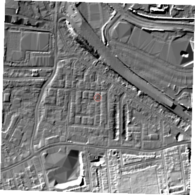 Shaded relief map of the ground around SE100HX, computed from Environment Agency LiDAR. The ground here sits at about 2 m above sea level and falls 16 m across the surrounding 800 m. Surface water reaching this point runs off ground lying to the south-east, 14.5 m higher.