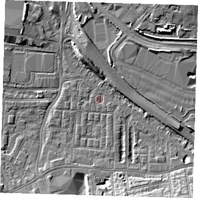 Shaded relief map of the ground around SE100JG, computed from Environment Agency LiDAR. The ground here sits at about 2 m above sea level and falls 10 m across the surrounding 800 m. Surface water reaching this point runs off ground lying to the south-east, 7.4 m higher.