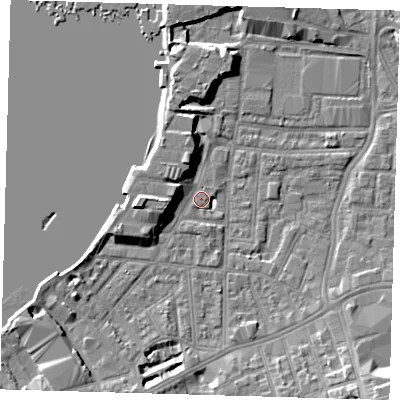 Shaded relief map of the ground around SE100NZ, computed from Environment Agency LiDAR. The ground here sits at about 2 m above sea level and falls 10 m across the surrounding 800 m. Surface water reaching this point runs off ground lying to the south-east, 8.6 m higher.