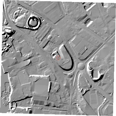 Shaded relief map of the ground around SE100PG, computed from Environment Agency LiDAR. The ground here sits at about 5 m above sea level and falls 16 m across the surrounding 800 m. Surface water reaching this point runs off ground lying to the south-east, 1.9 m higher.