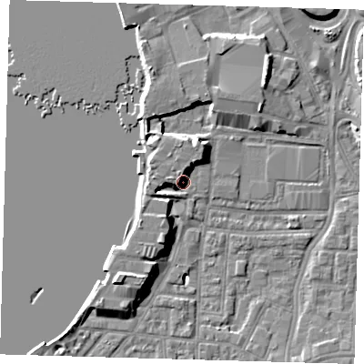 Shaded relief map of the ground around SE100TP, computed from Environment Agency LiDAR. The ground here sits at about 5 m above sea level and falls 9 m across the surrounding 800 m. Surface water reaching this point runs off ground lying to the west-north-west, 3.9 m higher.