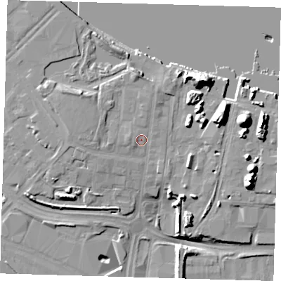 Shaded relief map of the ground around SE100XS, computed from Environment Agency LiDAR. The ground here sits at about 6 m above sea level and falls 21 m across the surrounding 800 m. Surface water reaching this point runs off ground lying to the west-north-west, 1.4 m higher.