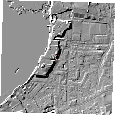 Shaded relief map of the ground around SE100YH, computed from Environment Agency LiDAR. The ground here sits at about 4 m above sea level and falls 9 m across the surrounding 800 m. Surface water reaching this point runs off ground lying to the west-south-west, 6.3 m higher.