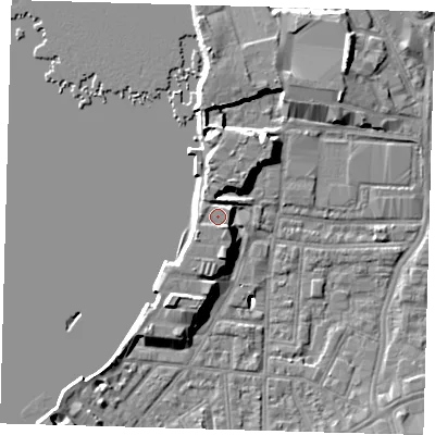 Shaded relief map of the ground around SE100YR, computed from Environment Agency LiDAR. The ground here sits at about 6 m above sea level and falls 9 m across the surrounding 800 m. Surface water reaching this point runs off ground lying to the south, 2.9 m higher.