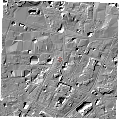 Shaded relief map of the ground around SE10AS, computed from Environment Agency LiDAR. The ground here sits at about 4 m above sea level and falls 14 m across the surrounding 800 m. Surface water reaching this point runs off ground lying to the south, 1.9 m higher.
