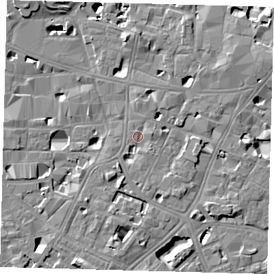 Shaded relief map of the ground around SE10AX, computed from Environment Agency LiDAR. The ground here sits at about 4 m above sea level and falls 14 m across the surrounding 800 m. Surface water reaching this point runs off ground lying to the east-north-east, 6.2 m higher.