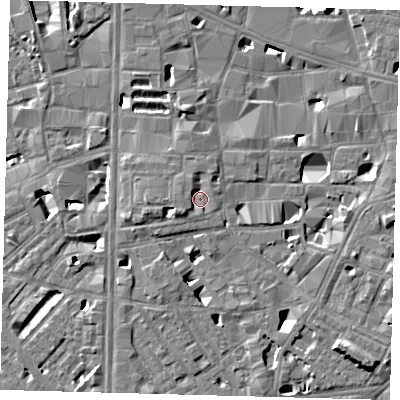 Shaded relief map of the ground around SE10BZ, computed from Environment Agency LiDAR. The ground here sits at about 4 m above sea level and falls 7 m across the surrounding 800 m. Surface water reaching this point runs off ground lying to the west-south-west, 2.1 m higher.