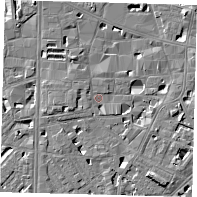 Shaded relief map of the ground around SE10DB, computed from Environment Agency LiDAR. The ground here sits at about 3 m above sea level and falls 7 m across the surrounding 800 m. Surface water reaching this point runs off ground lying to the east, 5.4 m higher.