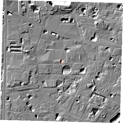 Shaded relief map of the ground around SE10FR, computed from Environment Agency LiDAR. The ground here sits at about 2 m above sea level and falls 14 m across the surrounding 800 m. Surface water reaching this point runs off ground lying to the east-south-east, 5.4 m higher.