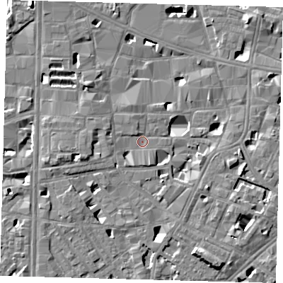 Shaded relief map of the ground around SE10HG, computed from Environment Agency LiDAR. The ground here sits at about 3 m above sea level and falls 7 m across the surrounding 800 m. Surface water reaching this point runs off ground lying to the east, 5.4 m higher.
