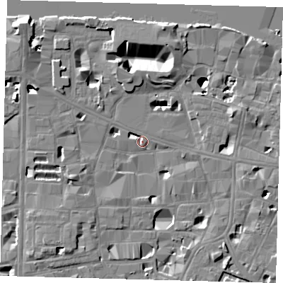 Shaded relief map of the ground around SE10HX, computed from Environment Agency LiDAR. The ground here sits at about 3 m above sea level and falls 16 m across the surrounding 800 m. Surface water reaching this point runs off ground lying to the east-north-east, 5.7 m higher.