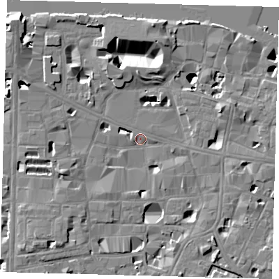 Shaded relief map of the ground around SE10JA, computed from Environment Agency LiDAR. The ground here sits at about 3 m above sea level and falls 16 m across the surrounding 800 m. Surface water reaching this point runs off ground lying to the south-east, 5.6 m higher.