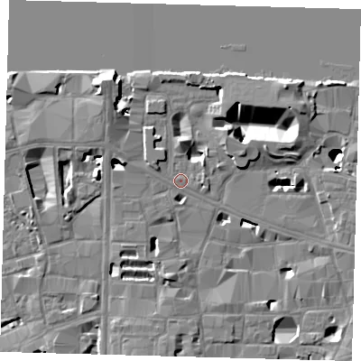Shaded relief map of the ground around SE10JQ, computed from Environment Agency LiDAR. The ground here sits at about 4 m above sea level and falls 16 m across the surrounding 800 m. Surface water reaching this point runs off ground lying to the north-west, 12.2 m higher.