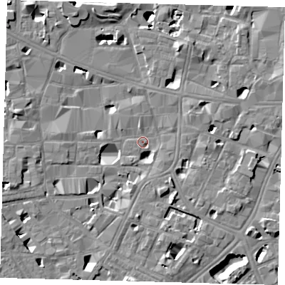 Shaded relief map of the ground around SE10LE, computed from Environment Agency LiDAR. The ground here sits at about 3 m above sea level and falls 14 m across the surrounding 800 m. Surface water reaching this point runs off ground lying to the south-east, 5.4 m higher.